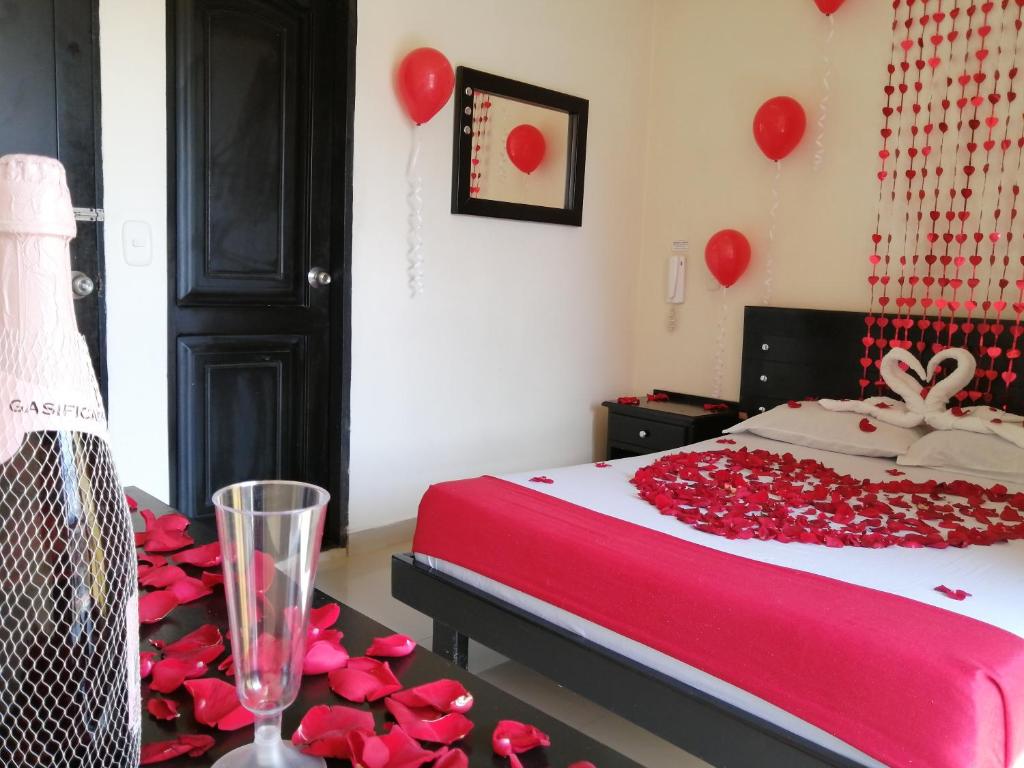 Postel nebo postele na pokoji v ubytování Hotel Portal Dorado