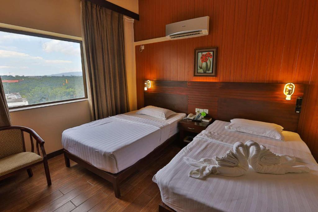 Postel nebo postele na pokoji v ubytování Hotel Essencia