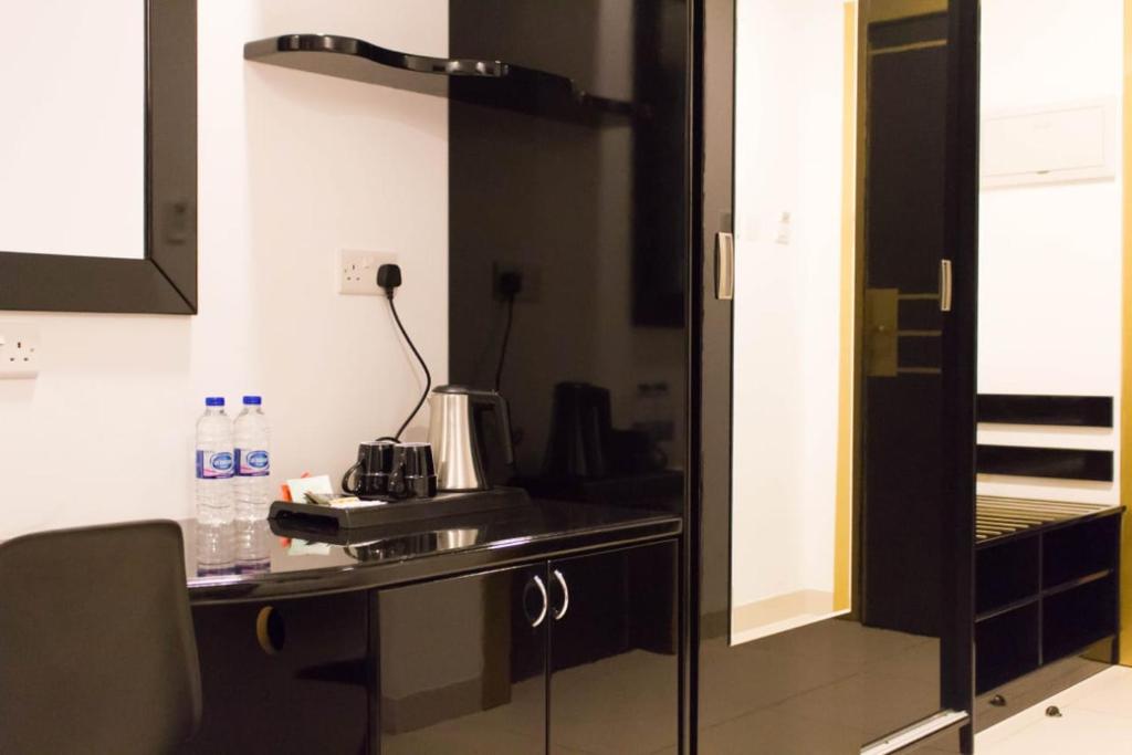 Kuchyň nebo kuchyňský kout v ubytování Parkside Plaza Muscat