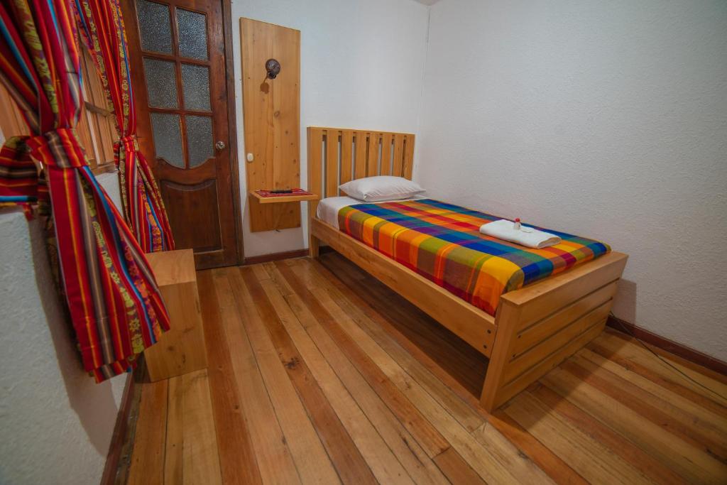 Postel nebo postele na pokoji v ubytování El Andariego