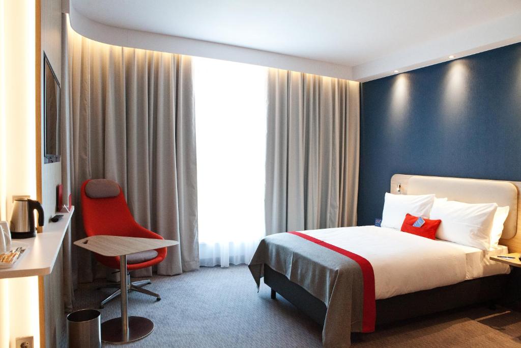 Postel nebo postele na pokoji v ubytování Holiday Inn Express - Saarbrücken by IHG