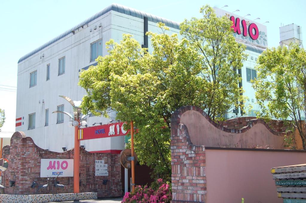 a building with a gate in front of it at Hotel Mio Resort ( Adult Only) in Yokkaichi