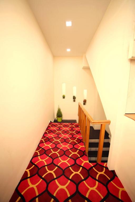 Postel nebo postele na pokoji v ubytování Banyan hotel&restro