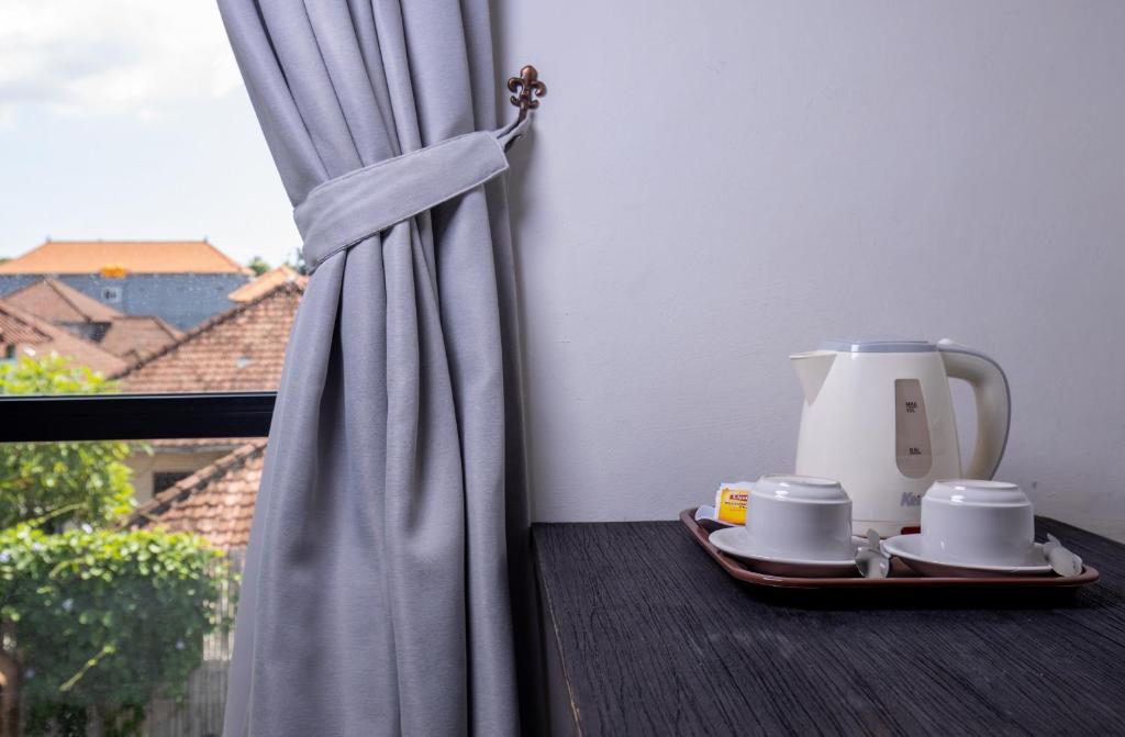 Příslušenství pro přípravu čaje a kávy v ubytování The Aswana Seminyak