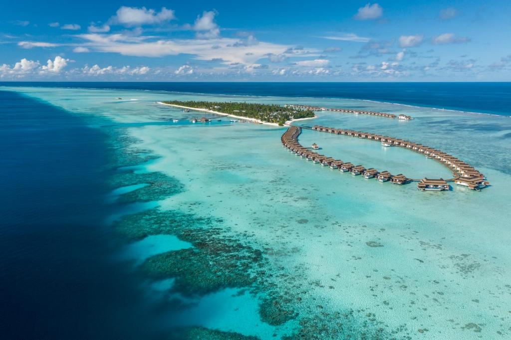 Et luftfoto af Pullman Maldives All-Inclusive Resort
