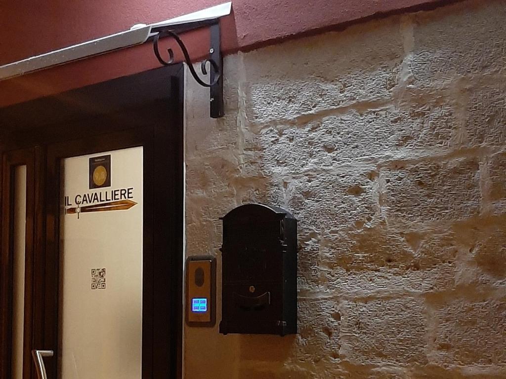 Telewizja i/lub zestaw kina domowego w obiekcie Il Cavalliere Bed & breakfast