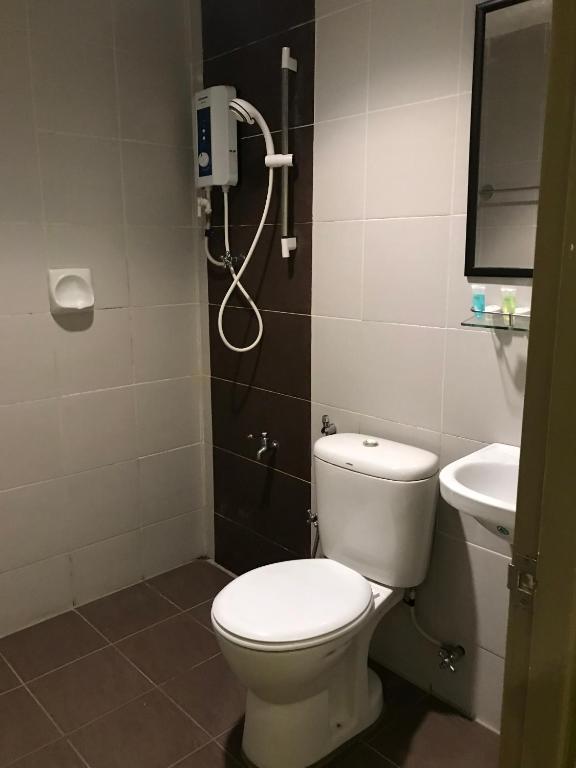 Koupelna v ubytování SARIKEI GARDEN HOTEL