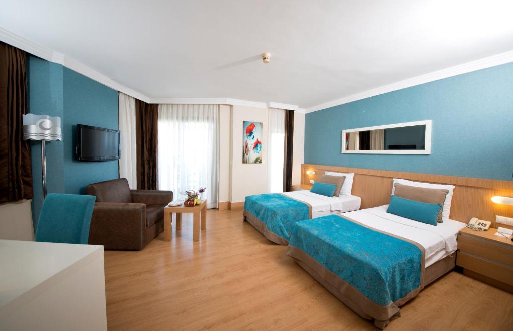 Postel nebo postele na pokoji v ubytování Limak Limra Hotel & Resort Kemer - Kids Concept