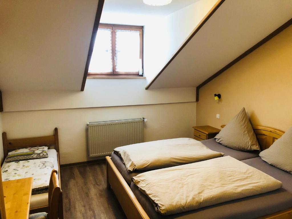 Postel nebo postele na pokoji v ubytování Landgasthof Penn