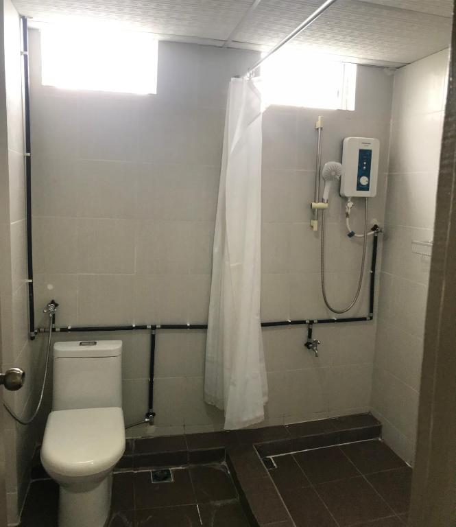 Koupelna v ubytování SARIKEI GARDEN HOTEL
