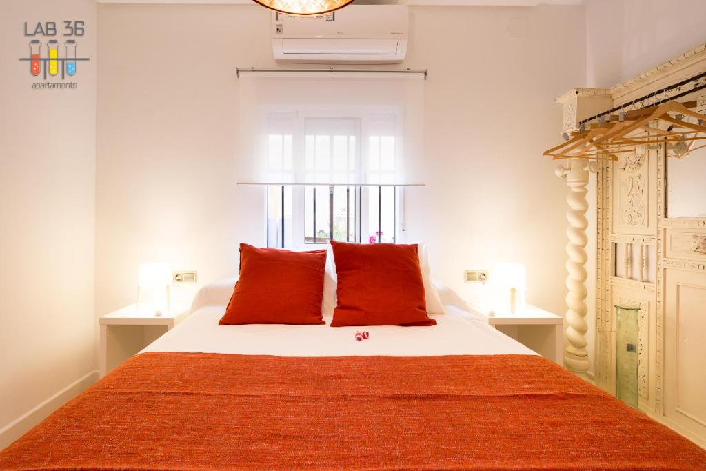 Posteľ alebo postele v izbe v ubytovaní LAB 36 Apartaments