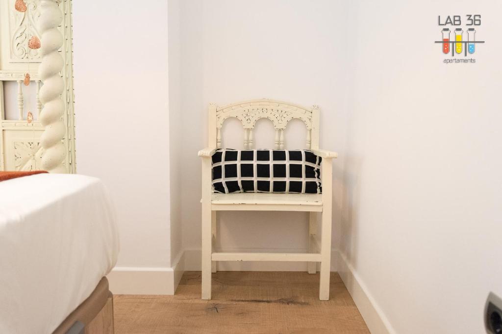 Posteľ alebo postele v izbe v ubytovaní LAB 36 Apartaments