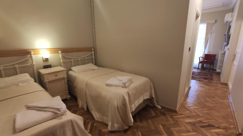 Postel nebo postele na pokoji v ubytování Turkoman Hotel