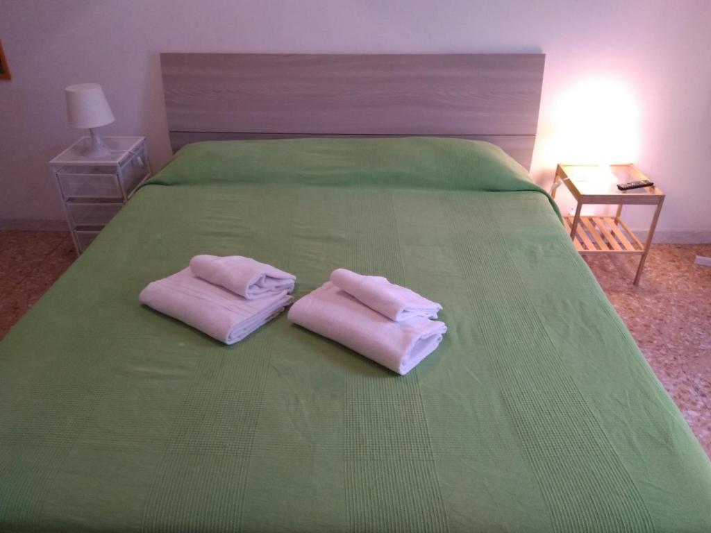 Postel nebo postele na pokoji v ubytování Next Stop Roma Affittacamere Casilino