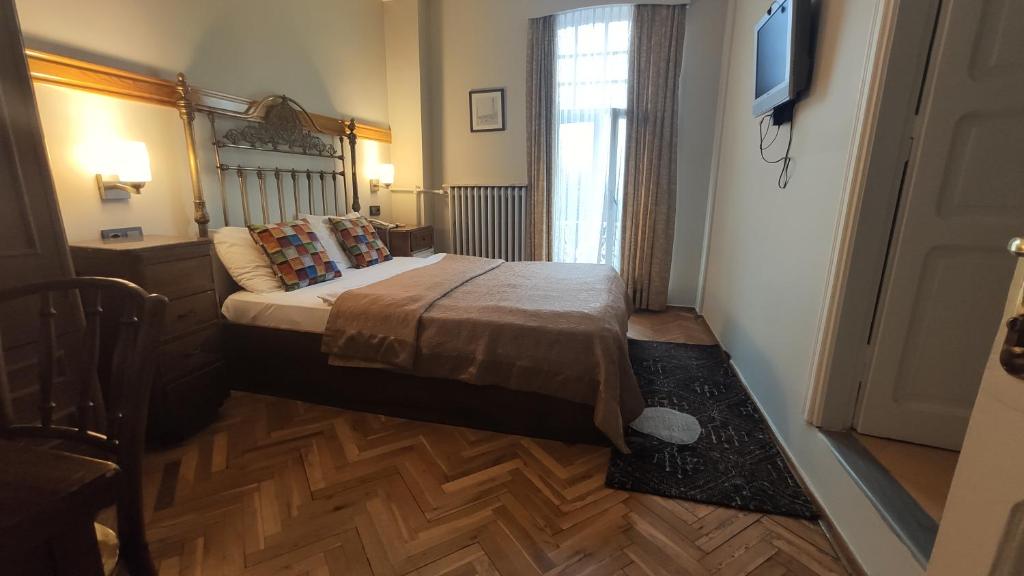 Postel nebo postele na pokoji v ubytování Turkoman Hotel