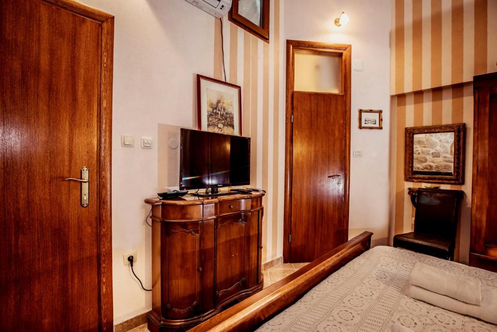 TV a/nebo společenská místnost v ubytování Dimora Picco Bello