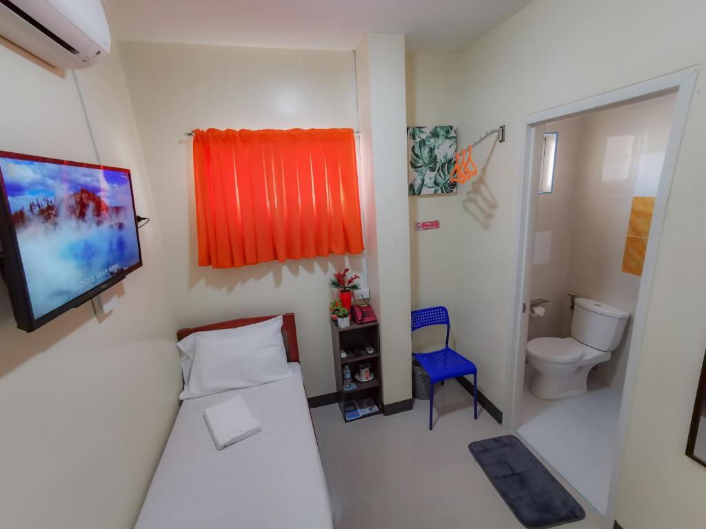 Koupelna v ubytování Downtown Suites