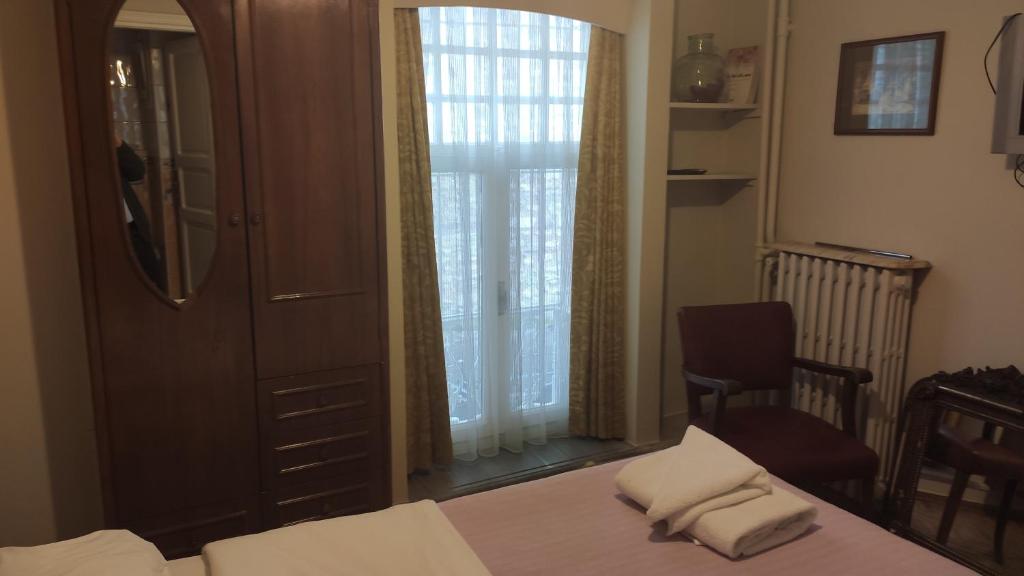 Postel nebo postele na pokoji v ubytování Turkoman Hotel