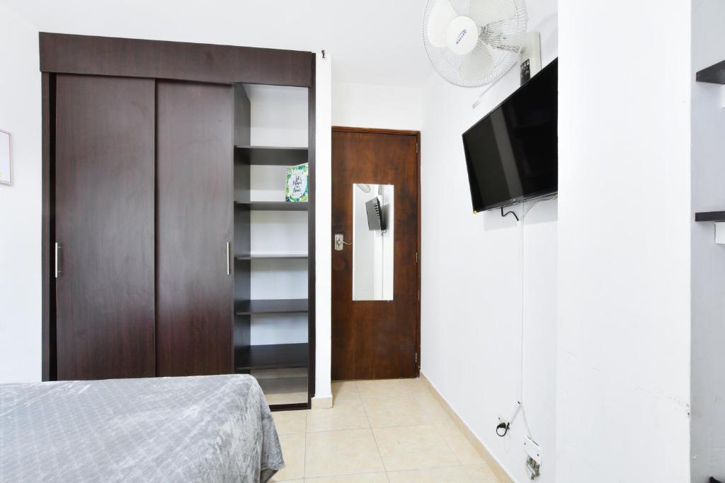 TV a/nebo společenská místnost v ubytování International House Co-Living