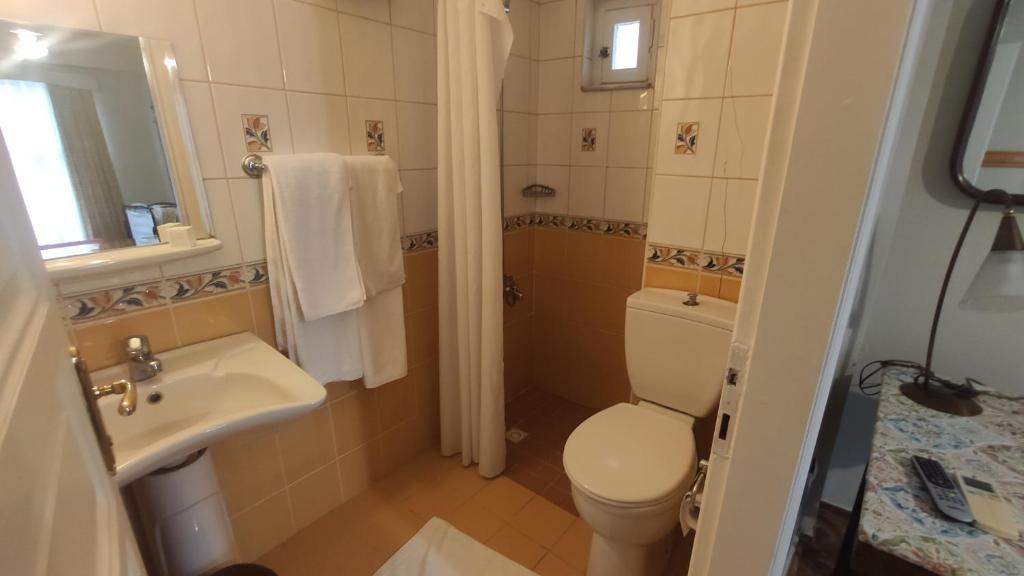Koupelna v ubytování Turkoman Hotel