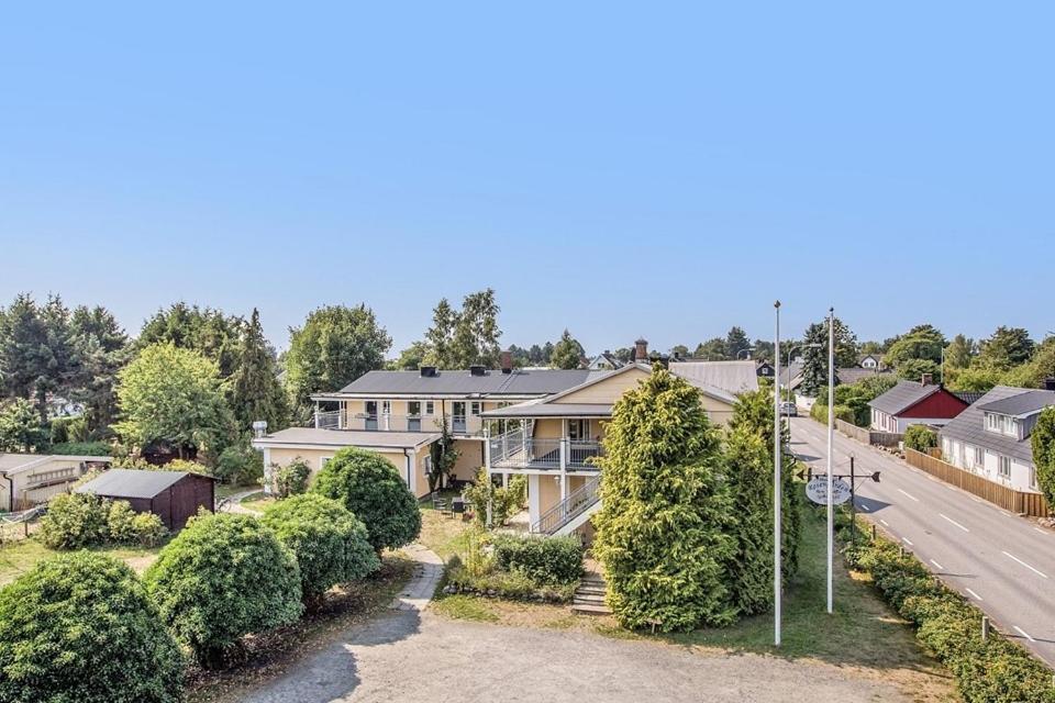 an aerial view of a house with a road at Villa Beddingestrand in Beddinge Strand