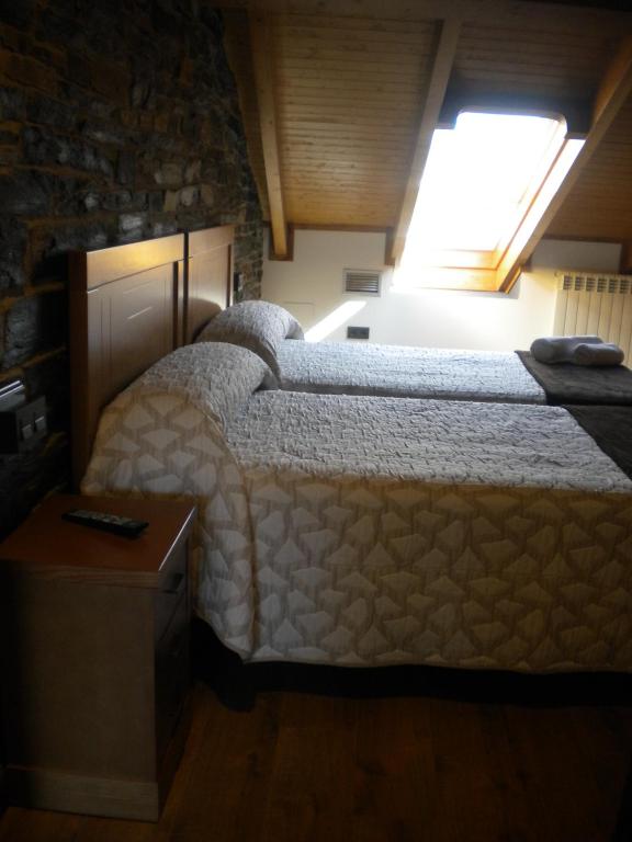Postel nebo postele na pokoji v ubytování Casa de Aldea Araceli