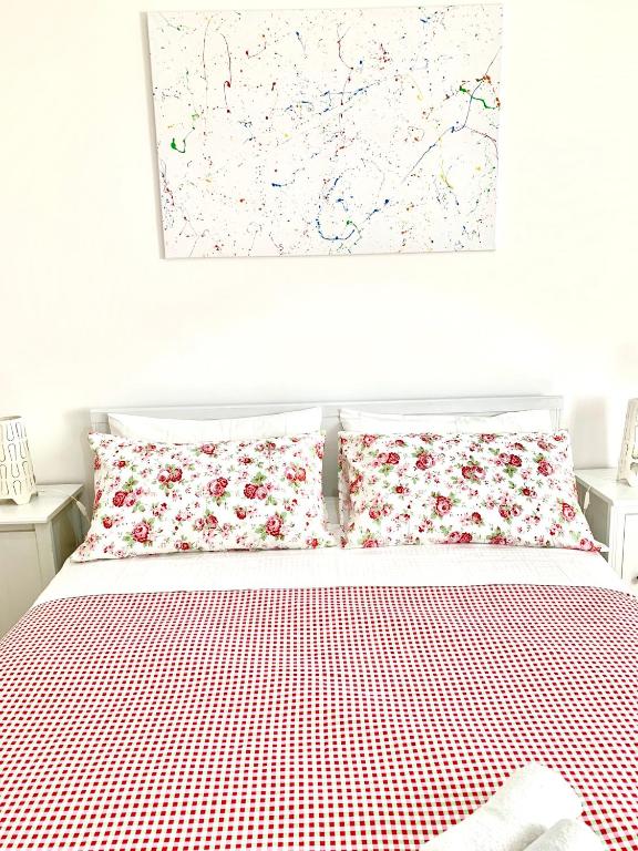 Łóżko lub łóżka w pokoju w obiekcie B&B Scilla Mare