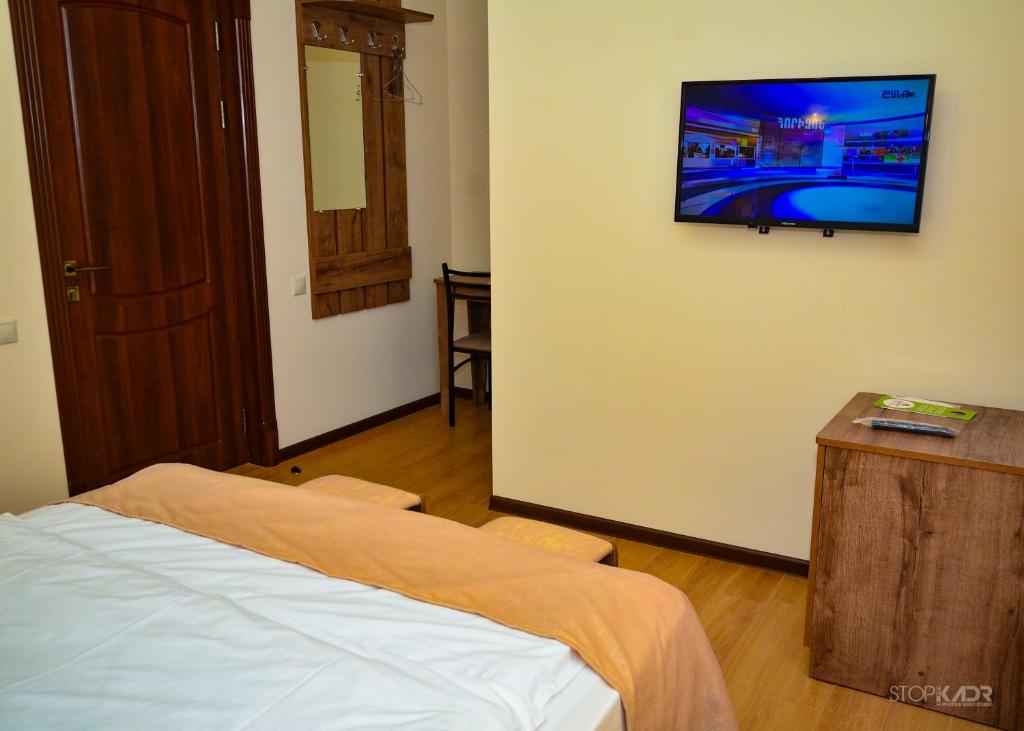 TV a/nebo společenská místnost v ubytování ASOUR HOTEL