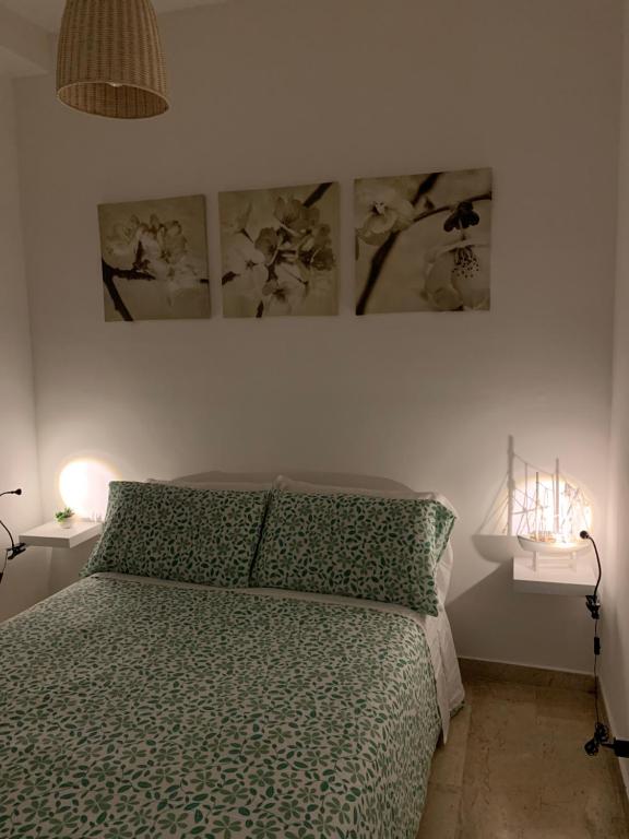 Łóżko lub łóżka w pokoju w obiekcie B&B Scilla Mare