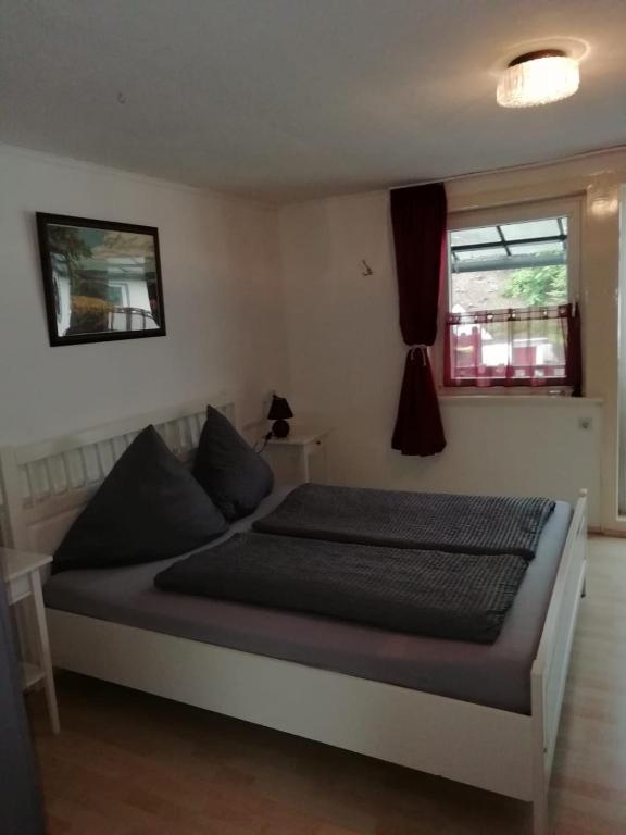 Postel nebo postele na pokoji v ubytování Hotel zur Post