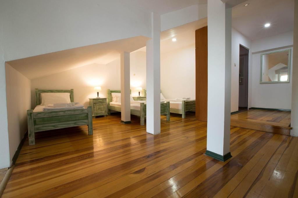 Postel nebo postele na pokoji v ubytování Hotel Trim