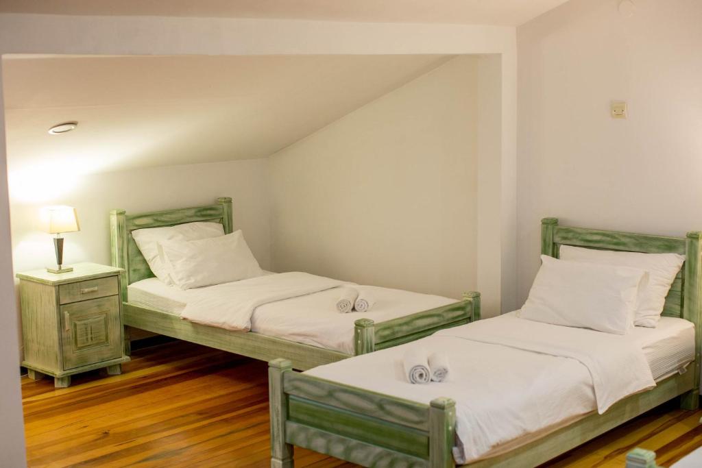 Postel nebo postele na pokoji v ubytování Hotel Trim