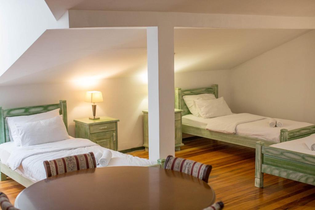 Postel nebo postele na pokoji v ubytování Hotel Trim