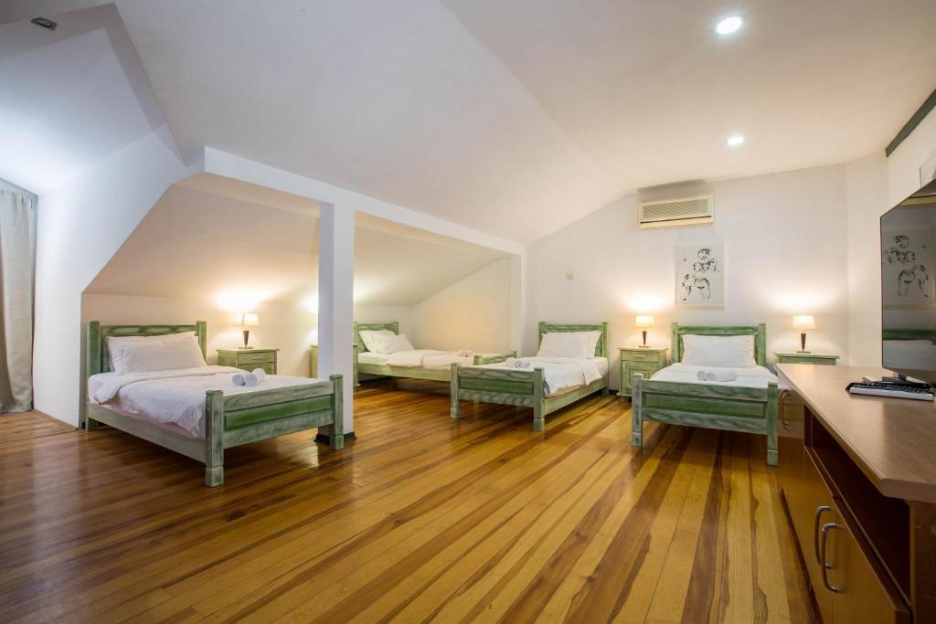 Postel nebo postele na pokoji v ubytování Hotel Trim