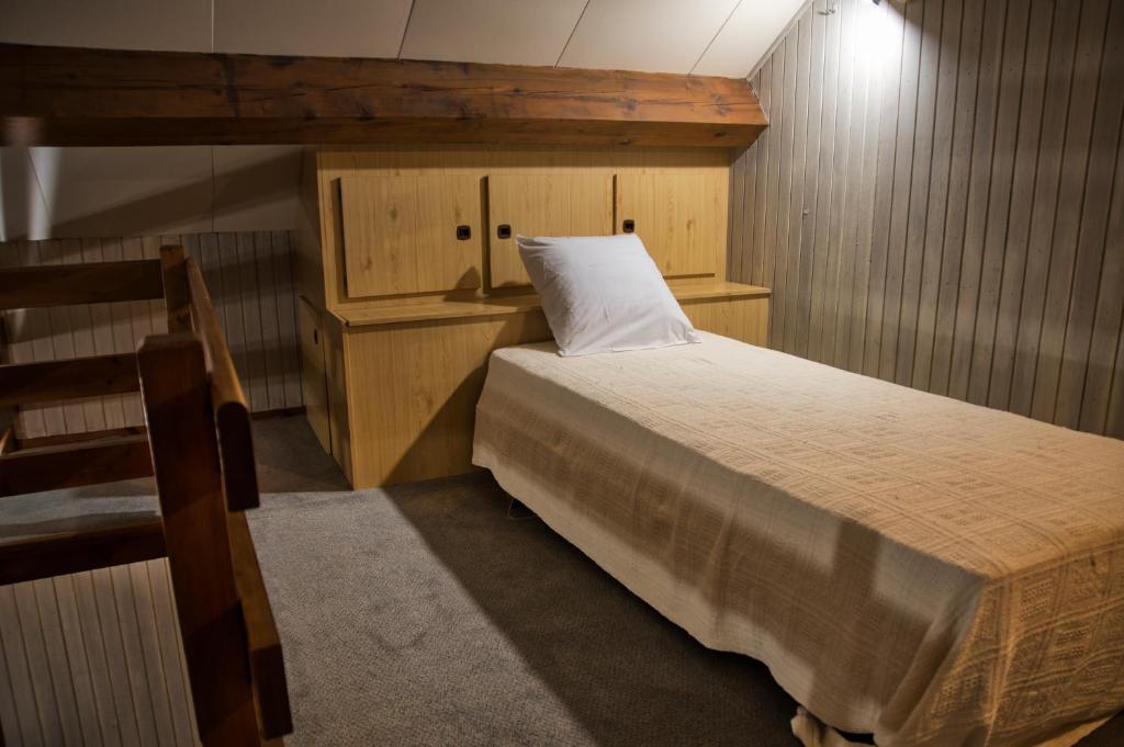 Postel nebo postele na pokoji v ubytování La Bastide d'Albignac