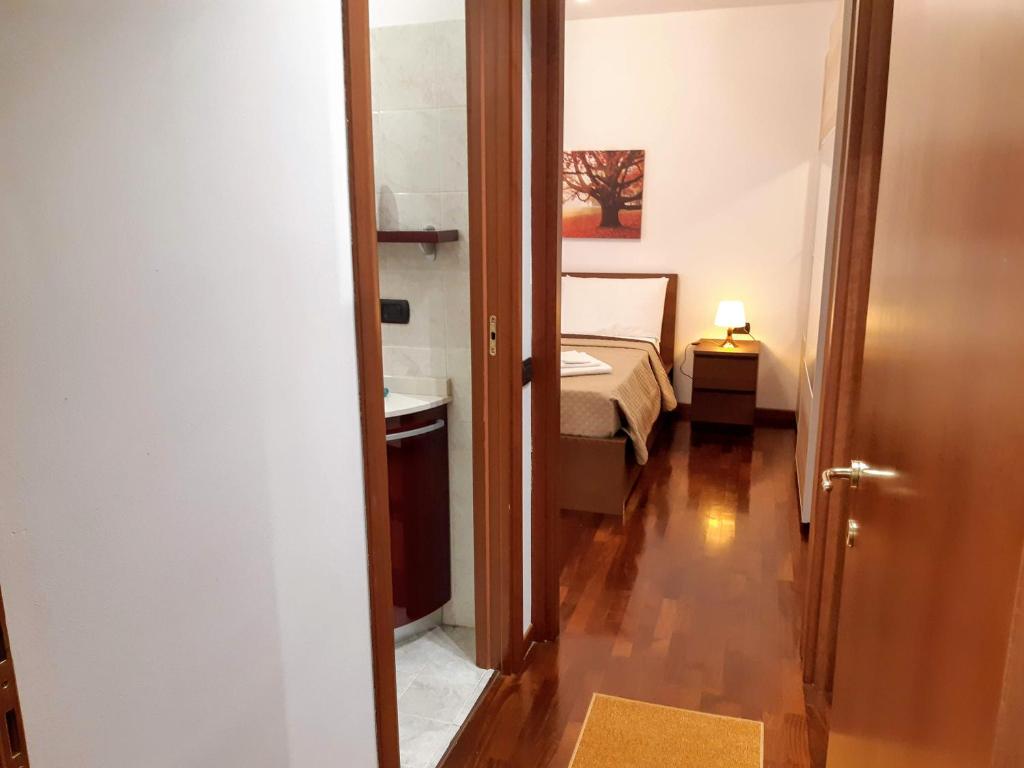 Łóżko lub łóżka w pokoju w obiekcie Suite Rent Milan