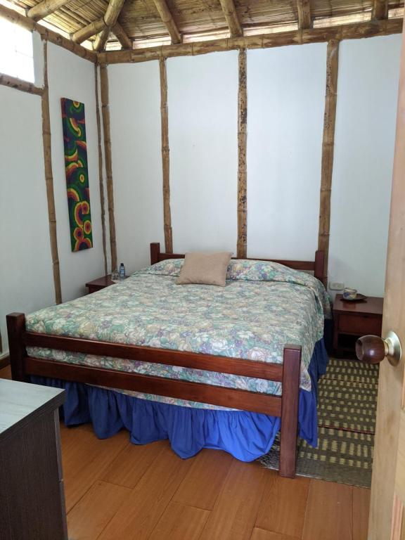 Voodi või voodid majutusasutuse Hacienda Guayabal toas