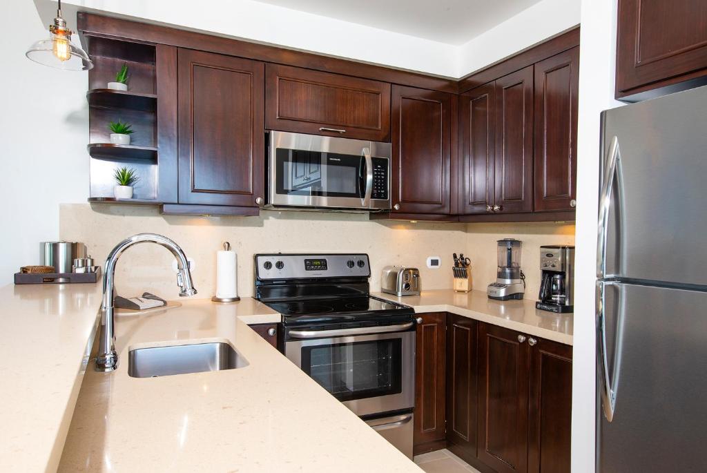 Kuchyň nebo kuchyňský kout v ubytování 360 Splendor Del Pacifico Residences