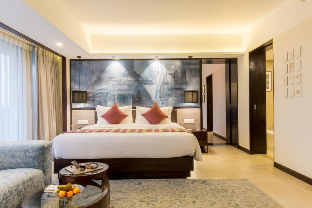 Postel nebo postele na pokoji v ubytování Vivanta Kathmandu