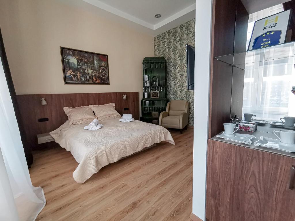 Postel nebo postele na pokoji v ubytování K43 Rooms