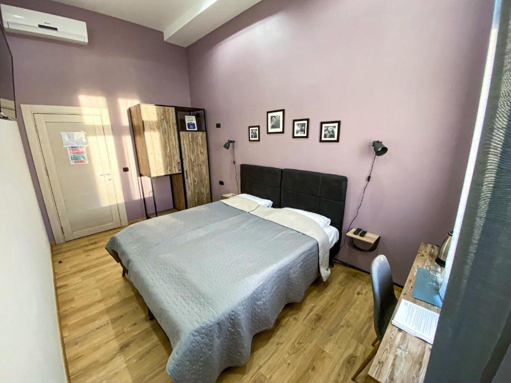 Postel nebo postele na pokoji v ubytování K43 Rooms
