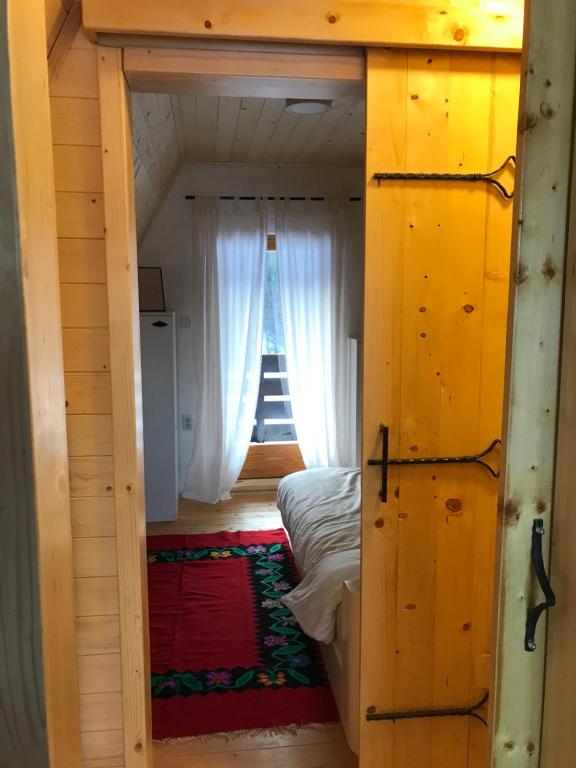 Postel nebo postele na pokoji v ubytování Suncana dolina Tara
