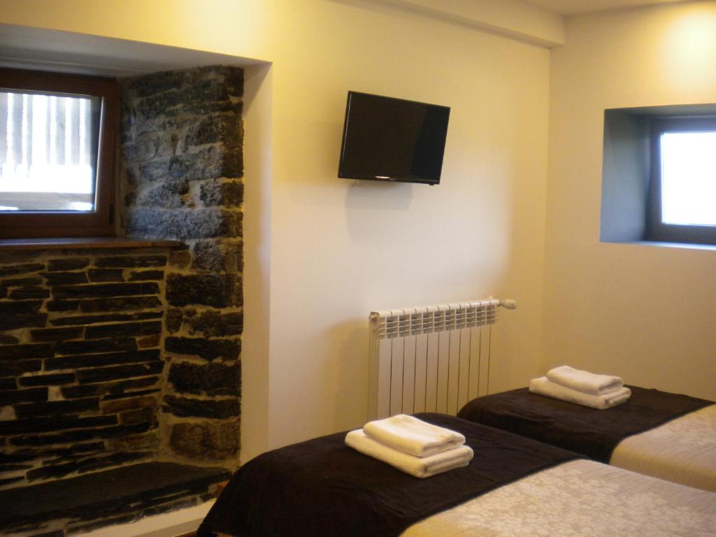 Postel nebo postele na pokoji v ubytování Casa de Aldea Araceli