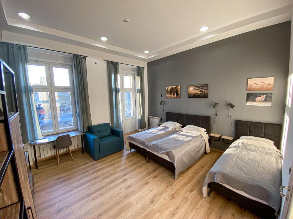 Postel nebo postele na pokoji v ubytování K43 Rooms