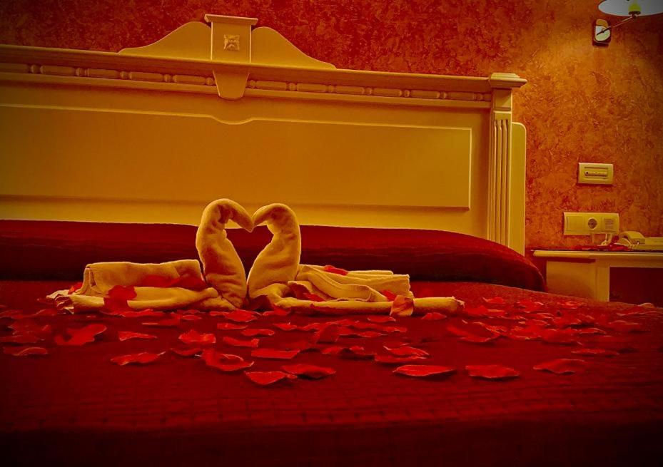 Posteľ alebo postele v izbe v ubytovaní Hotel Acosta Vetonia