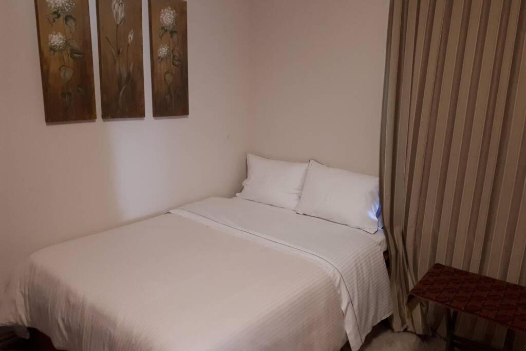 Postel nebo postele na pokoji v ubytování Eufrosini Guesthouse