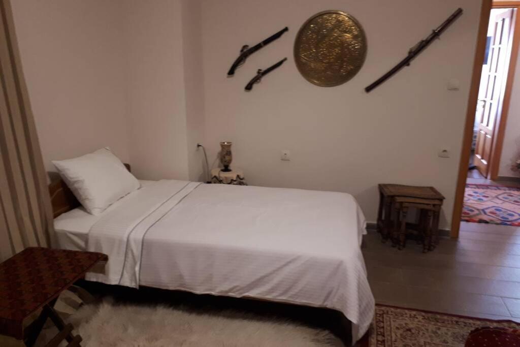 Postel nebo postele na pokoji v ubytování Eufrosini Guesthouse
