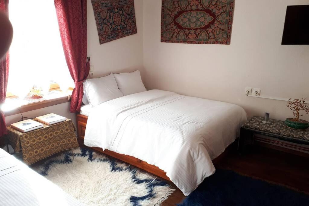 Postel nebo postele na pokoji v ubytování Eufrosini Guesthouse