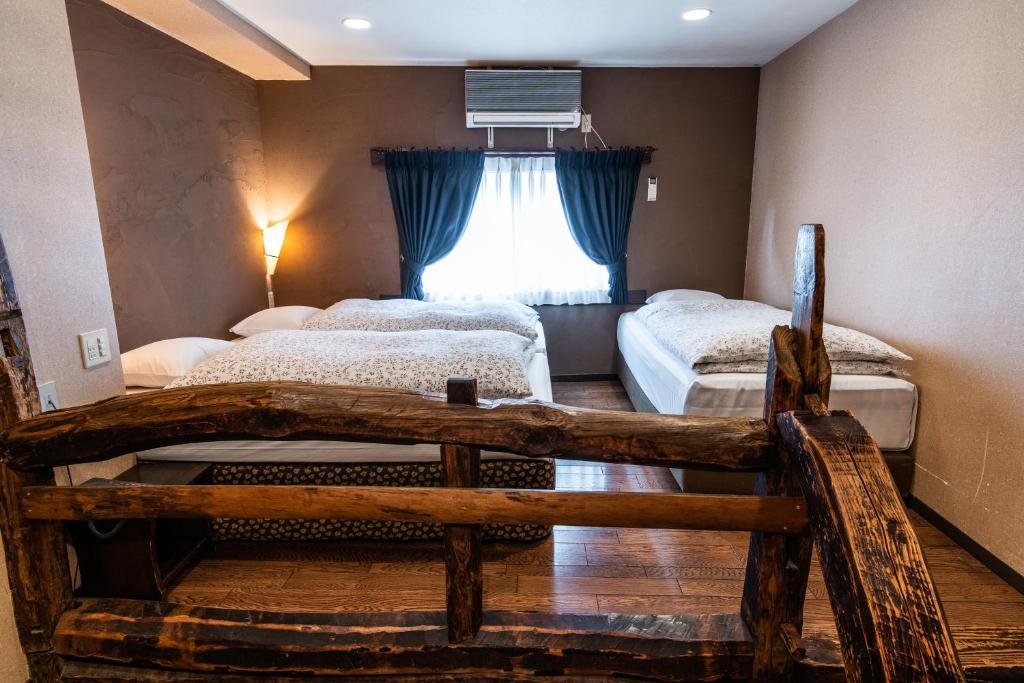 Postel nebo postele na pokoji v ubytování Hotel Haus St Anton