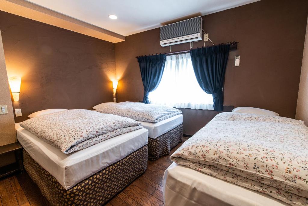 Postel nebo postele na pokoji v ubytování Hotel Haus St Anton